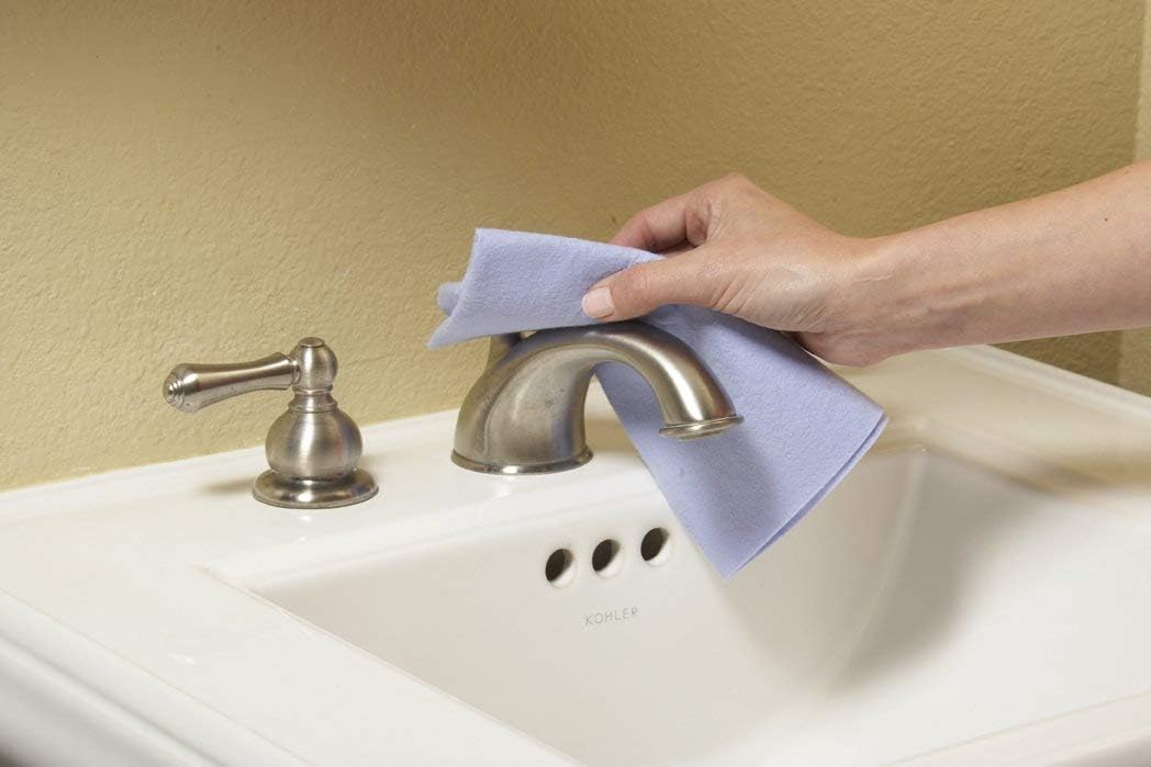 ShamWow Original Super Absorbent Multi-Purpose Cleaning Shammy Chamois Towel Cloth - Holds 10X its Weight in Liquid - Machine Washable - Will Not Scratch (2 Pack: 1 Large Orange & 1 Small Blue).