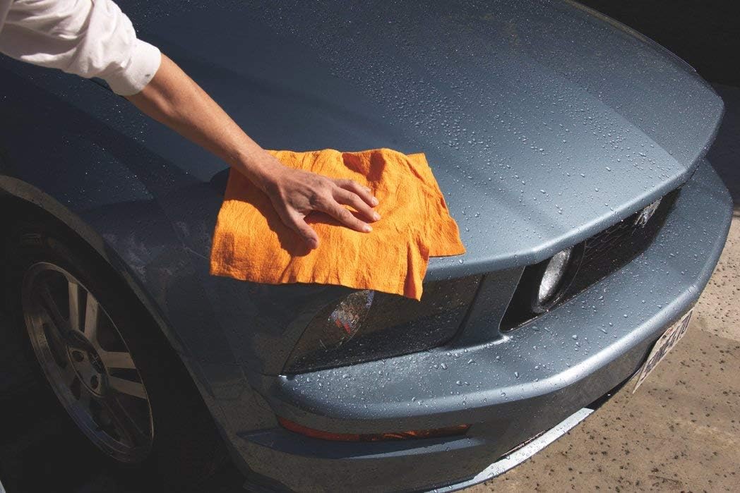 ShamWow Original Super Absorbent Multi-Purpose Cleaning Shammy Chamois Towel Cloth - Holds 10X its Weight in Liquid - Machine Washable - Will Not Scratch (2 Pack: 1 Large Orange & 1 Small Blue).