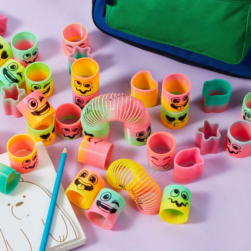 JOYIN 240 Pcs Spring Rainbow Party Favor, Mini Plastic Coil Spring Toy, Fidget Stress Coil Mini Springs Bulk Toys for Carnival Prize Birthday, Classroom Goodie Bag Stuffers