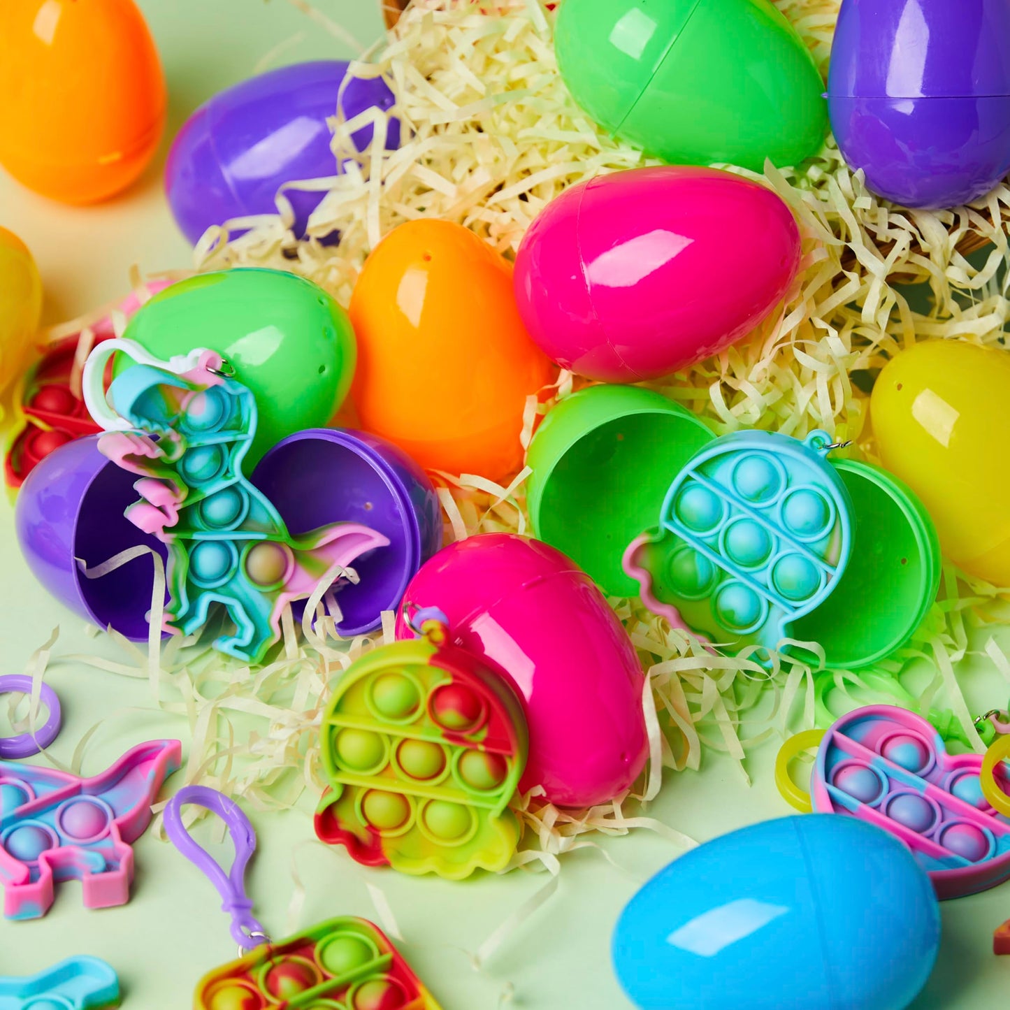 JOYIN 24 Pcs Pre Filled Easter Eggs with pop Keychain Toys for Easter Theme Party Favor, Pop Fidget Stress Relief Squeeze Bubble for Eggs Hunt, Classroom Exchange and Game Prize Supplies