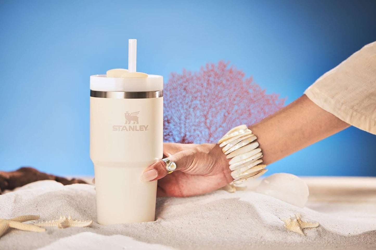 STANLEY Quencher H2.0 Tumbler with Straw 20 oz | Flowstate 3-Position Lid | Cup Holder Compatible for Travel | Insulated Stainless Steel Cup | BPA-Free | Cream