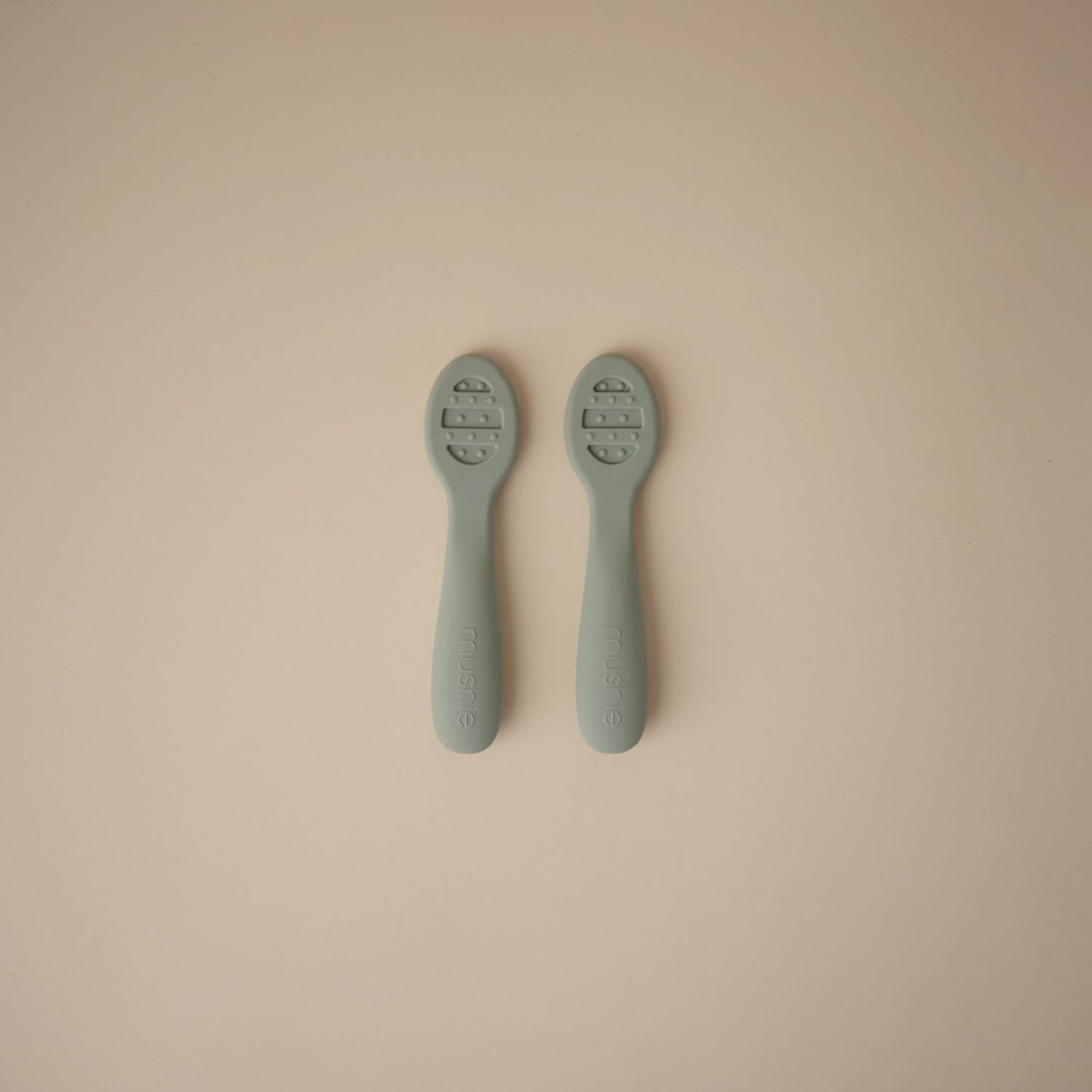 Mushie Silicone Baby Feeding Spoons - Soft, Safe & Durable | 2 Pack in Cambridge Blue & Shifting Sand