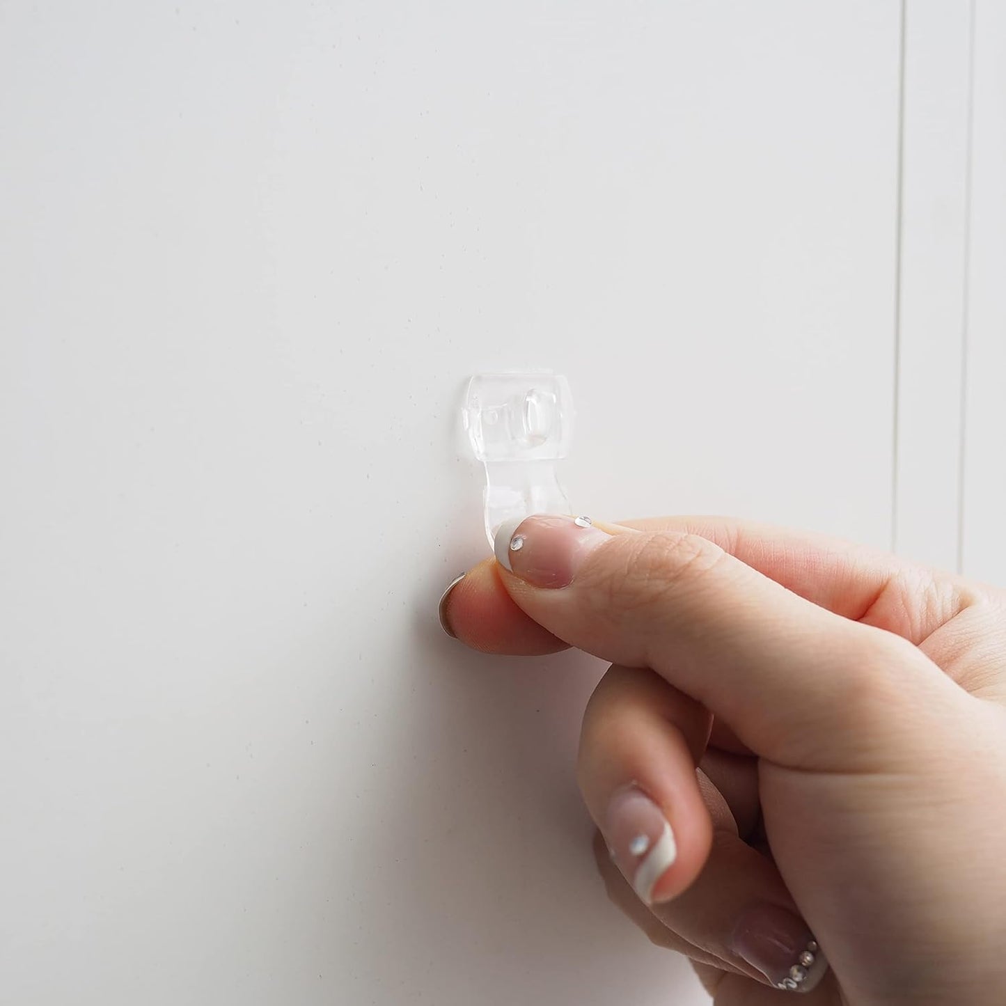 MOVELYST Mini Clear Light Clips - 100 Damage-Free Indoor Wall Hooks with 120 Adhesive Strips for Easy Hanging