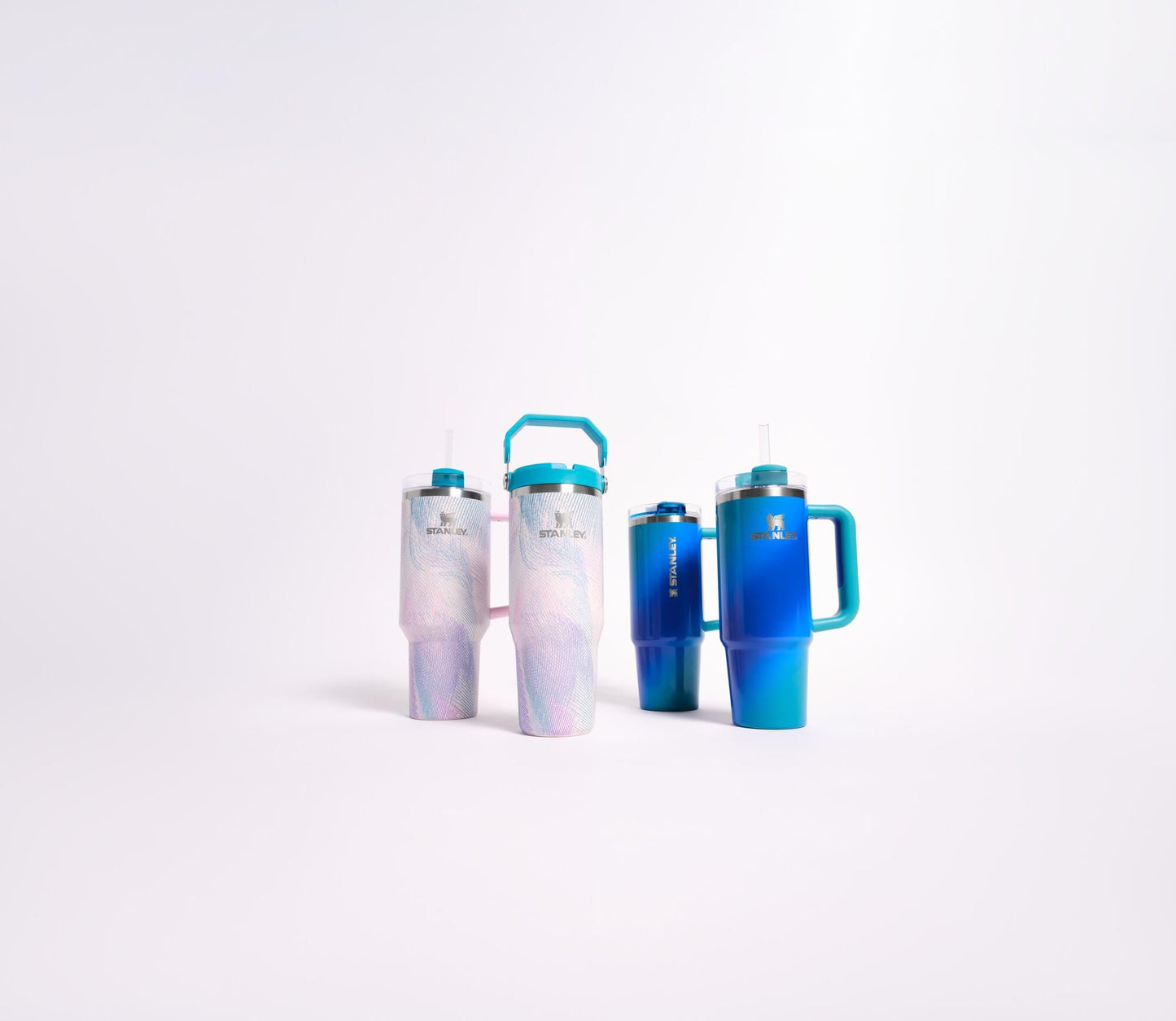 STANLEY Quencher ProTour Flip Straw Tumbler with Leakproof Lid 20 oz | Built-In Straw & Handle | Cupholder Compatible for Travel | Insulated Stainless Steel Cup | BPA-Free | Sea Glass Plume