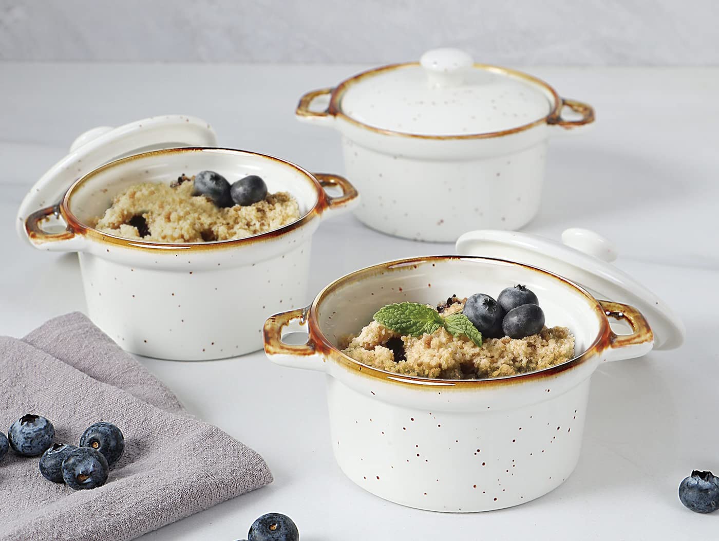 ONEMORE Mini Cocotte Set of 4, 6 oz Ceramic Ramekins with Lids and Handles, Small Casserole Dishes for Oven, Mini Dutch Oven for French Onion Soup, Souffle and Baking, Microwave & Dishwasher Safe, Creamy White