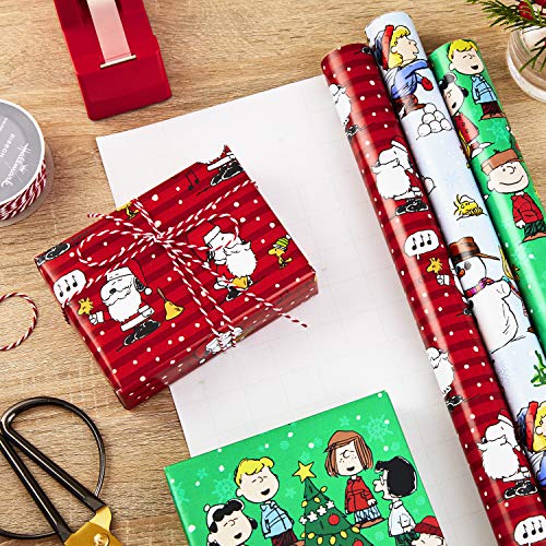Hallmark Christmas Peanuts Wrapping Paper with Cut Lines, 3-Pack Holiday Gift Wrap