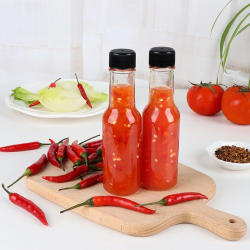 GUANENA 35 Pack 3oz Hot Sauce Bottles, Clear Glass Woozy Bottles with Leak Proof Black Screw Caps, Dripper Inserts and Shrink Capsules, Empty Small Wine Bottle with Labels (Bonus Funnel and Twine)
