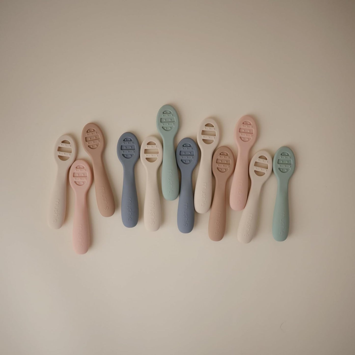 Mushie Silicone Baby Feeding Spoons - Soft, Safe & Durable | 2 Pack in Cambridge Blue & Shifting Sand