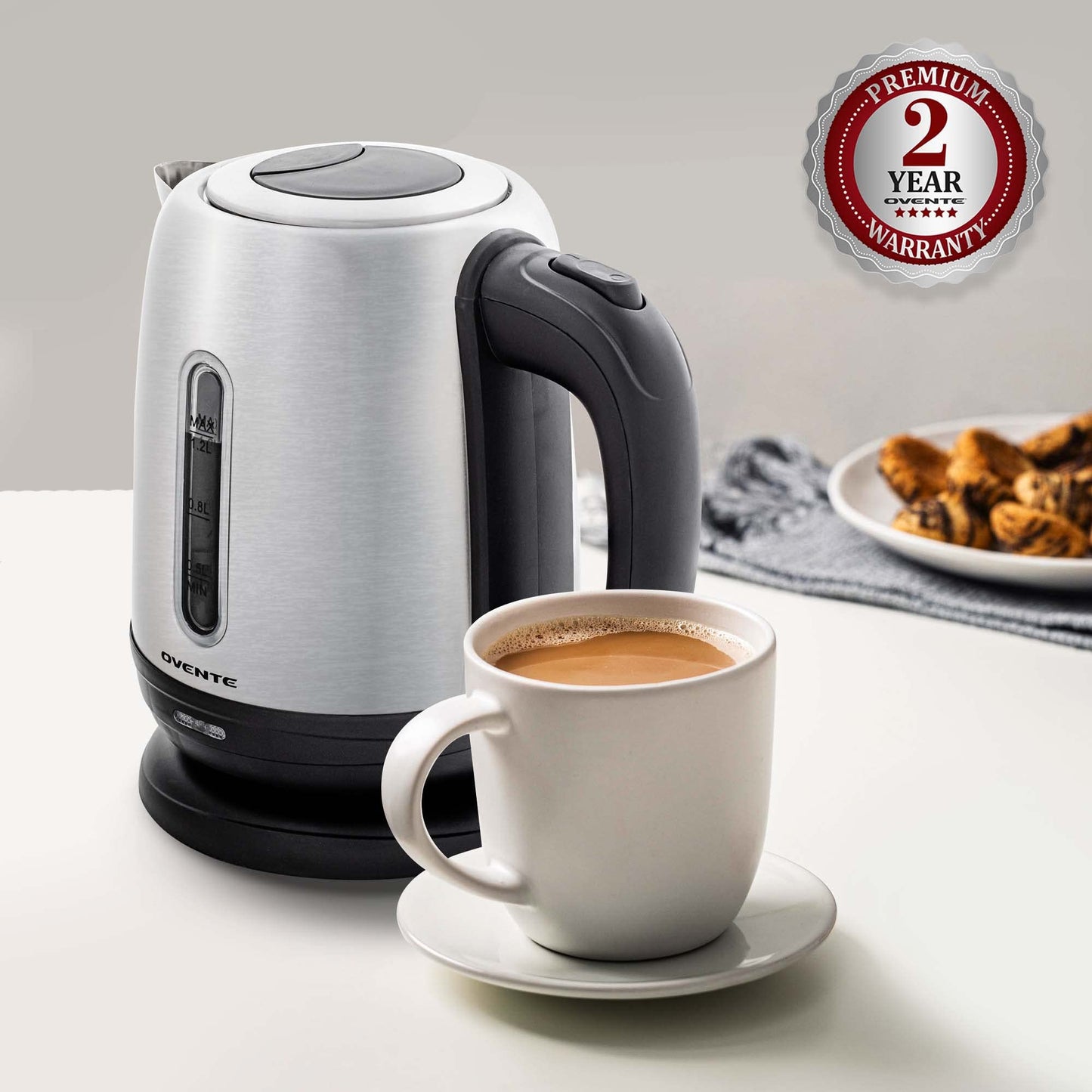 OVENTE Electric Tea Kettle Stainless Steel 1.2 Liter Portable Instant Water Boiler Heater 1100W Power Fast Boiling with Cordless Body and Automatic Shut Off for Coffee Milk Chocolate Silver KS22S