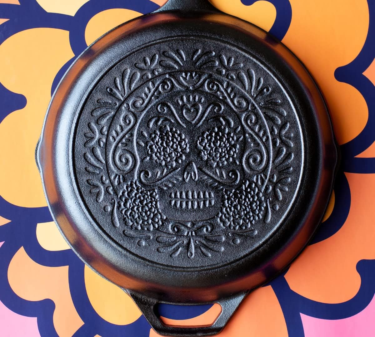 Lodge 10.25 Inch Pre-Seasoned Cast Iron Skillet - Versatile Use on Stove, Grill, or Campfire - Sugar Skull Design
