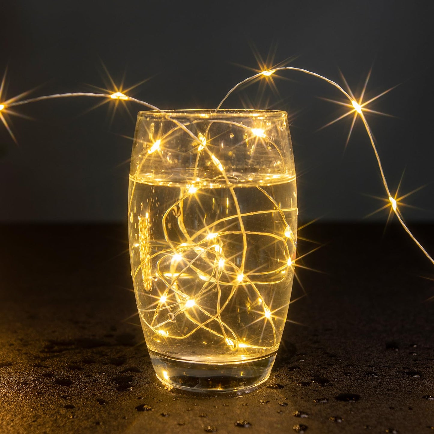 ZELUXDOT Fairy Lights Plug in,100FT 600 LEDs Waterproof Led String Lights,8 Modes Remote Twinkle Light for Bedroom Window Weddings Christmas Holiday Decoration,Silver Wire,2 Inch Led Space,Warm White