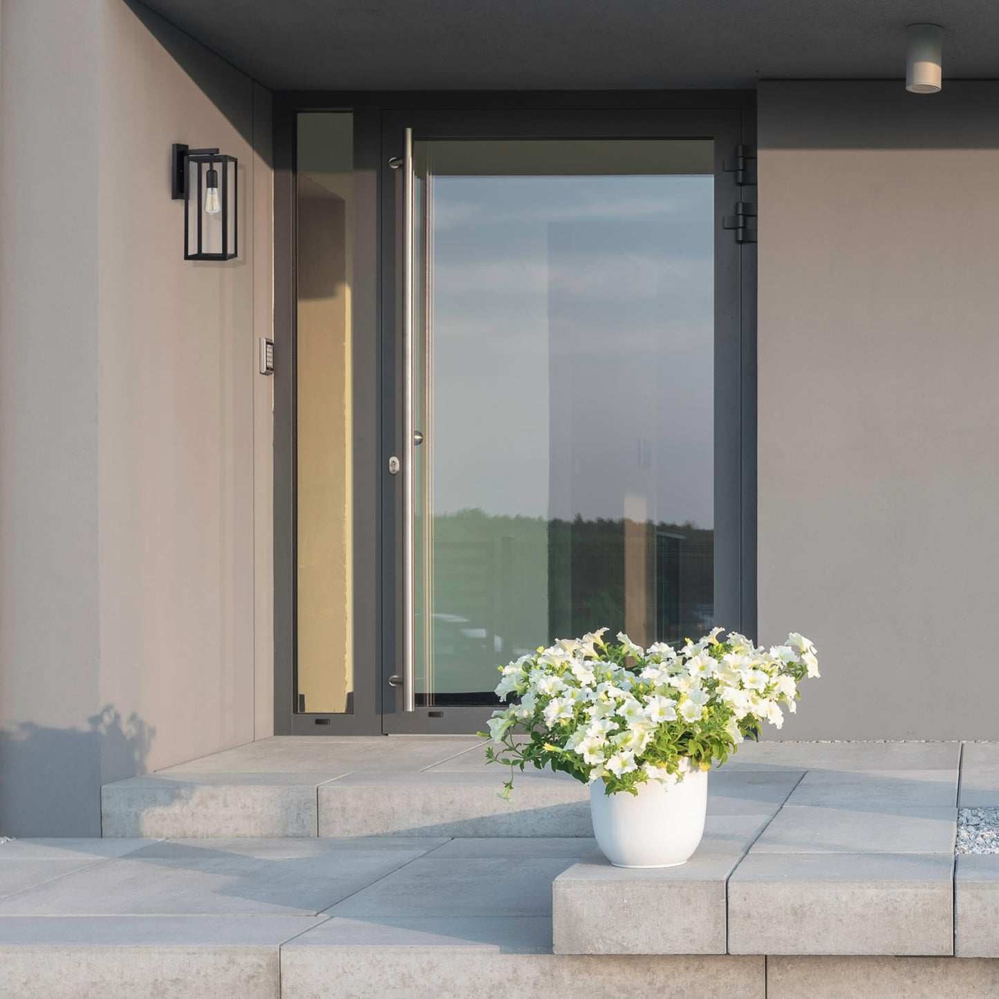 GLOBE Electric 44176 1-Light Outdoor/Indoor Wall Sconce, Matte Black Finish, Clear Glass Shade, Weather-Resistant Modern Exterior Light