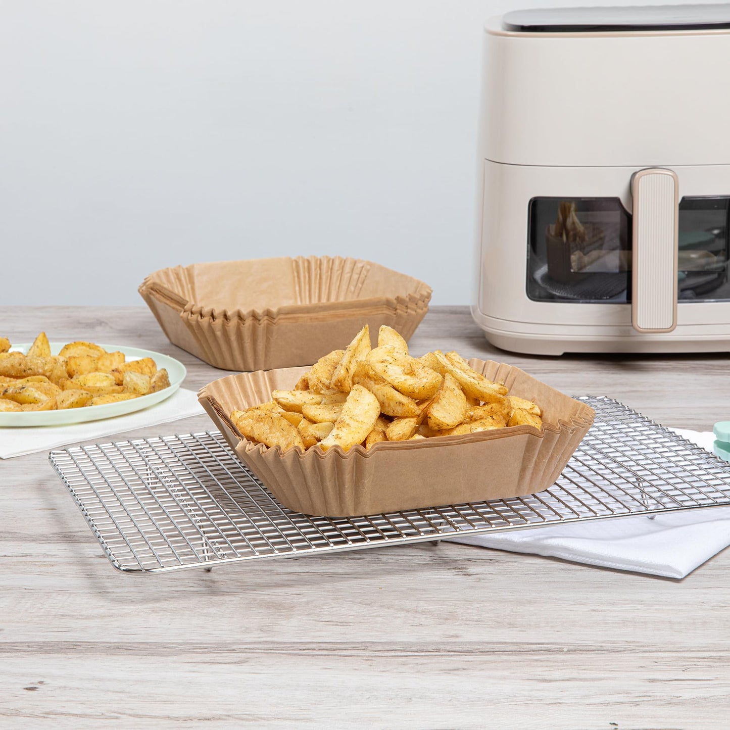 Restaurantware-Pastry Tek 6.3 x 6.3 x 1.8 Inch Air Fryer Liners, 100 Square Air Fryer Baskets - No-Stick Silicone Coating, Unbleached, Food-Grade Paper Liners, For Steamer, Microwave, Oven, Fry Pan