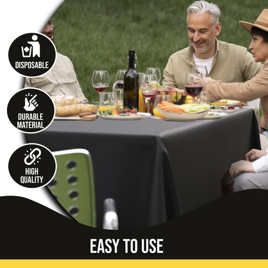 Party Solids 12-Pack Black Plastic Disposable Tablecloth – Size: 60 × 84 Inches – Rectangle Table Cover for Parties, Picnics & Formal Events