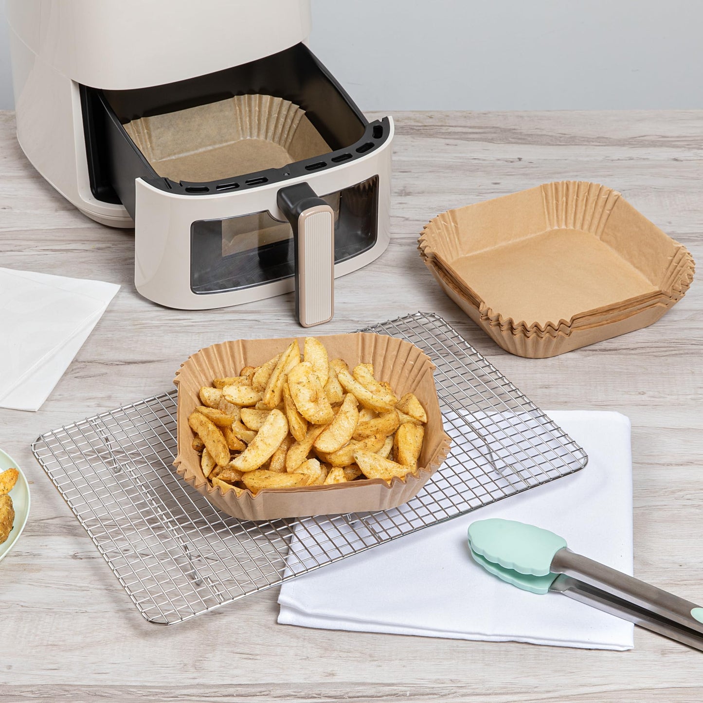 Restaurantware-Pastry Tek 6.3 x 6.3 x 1.8 Inch Air Fryer Liners, 100 Square Air Fryer Baskets - No-Stick Silicone Coating, Unbleached, Food-Grade Paper Liners, For Steamer, Microwave, Oven, Fry Pan