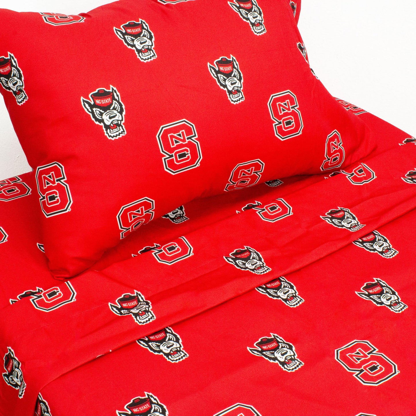 College Covers Everything Comfy North Carolina State Wolfpack Queen Sized 4 Piece Sheet Set, Team Color Background, 1 Flat Sheet, 1 Fitted Sheet, 2 Pillowcases