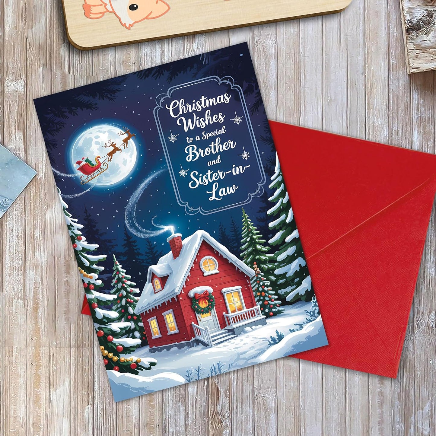 Regine Switzerland Christmas Card - Cozy Winter Cottage Design with Santa Sleigh | Festive Greeting for Brother & Sister-in-Law, 5.3''x8'' with Red Envelope