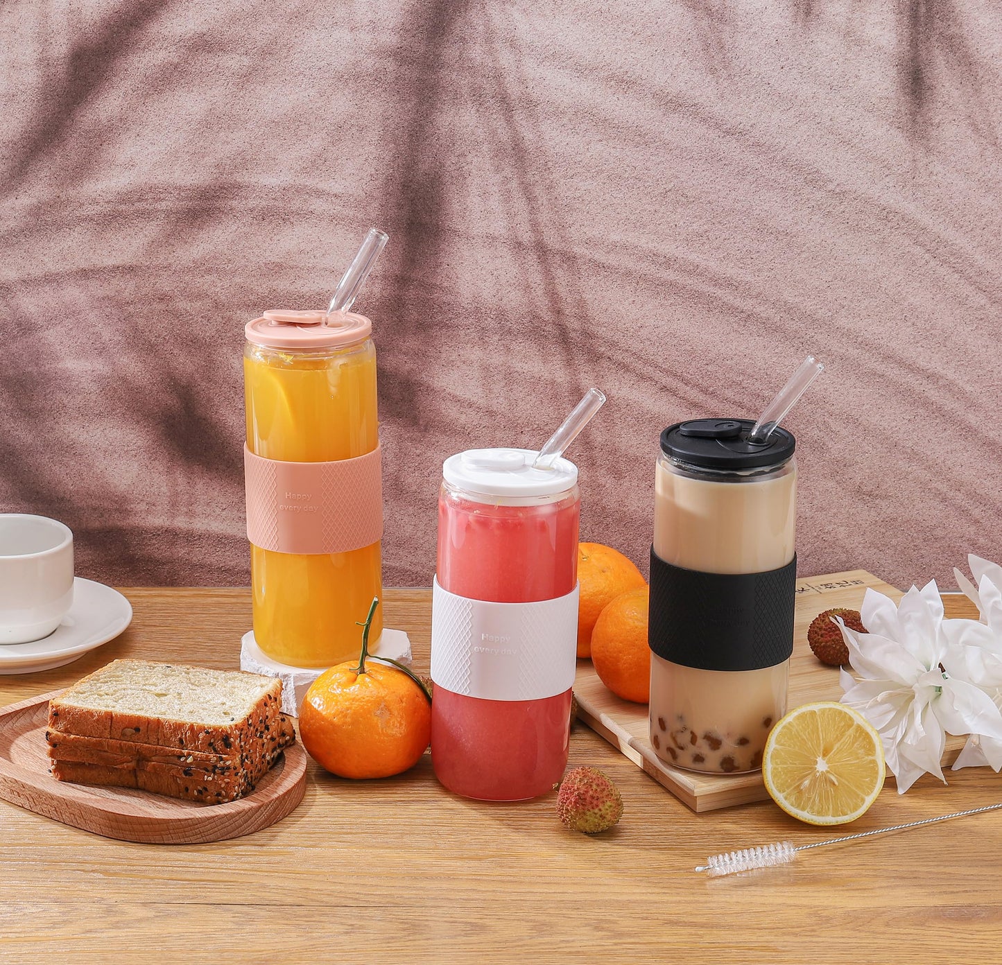 ASANMEYO 20oz Can Shaped Glass Cups with Silicone Lids and Glass Straw, 2PCS Drinking Glasses with Lids and Straws, and Silicone Sleeves, Beer Glasses, Iced Coffee Cups, Soda, Gift - Pink